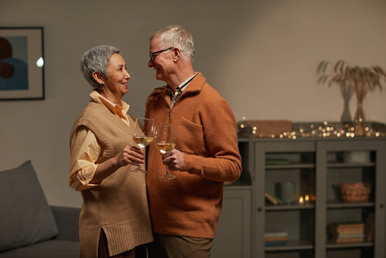 2 people dancing at home with urinal product